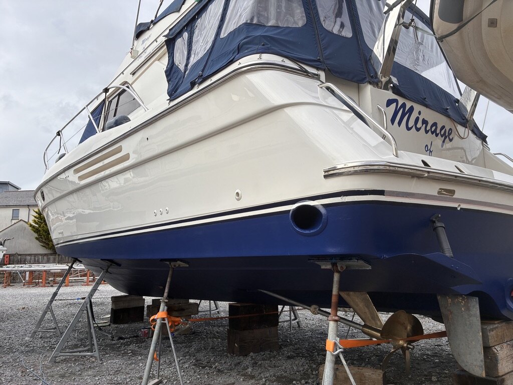Finished polished hull, fresh blue antifoul and polished bronze propellers